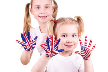 American,And,English,Flags,On,Child's,Hands.,Learning,English,Language